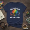 See The Able Not The Label autism awareness t-shirt with rainbow brain tree graphic and infinity symbols