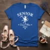 SENIOR Dance Mom 2025 text with a silhouette of a dancer holding ribbons, on a blue t-shirt