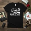 Senior MOM Class Of 2023 T-Shirt with "I'm Not Crying-You're Crying" quote in white typography. Features graduation cap and diploma