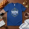 Shabbat Shalom Y'all T-Shirt with yellow circular design, candles, and handshake graphic