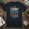 SHE Designed THE LIFE SHE Loved quote t-shirt with city skyline and tree graphic, inspirational design