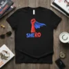 Black t-shirt with red and blue "SHERO" text and a superhero fist with a blue cape