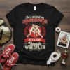 T-shirt with "She's not just my GRANDDAUGHTER SHE'S ALSO MY Favorite WRESTLER" text and graphic of two female wrestlers in