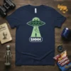SHHH Alien Abduction T-Shirt design with a UFO beaming down a person and the word SHHH