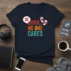 SHHH... NO ONE CARES quote in distressed typography with speech bubble and crossed-out ears graphic on a navy t-shirt