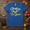 Blue t-shirt with white and yellow text "Shofar So Good" and a graphic of a shofar, designed for Jewish holidays