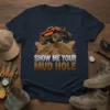 Monster truck climbing a muddy hill with "Show Me Your Mud Hole" text, navy blue t-shirt graphic