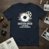 T-shirt design with "SHUTTER SPEED FILM CAMERA ANALOG PHOTOGRAPHY" text, a camera aperture graphic, and a film reel