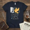Christian t-shirt with "Sing to the Lord" text, a yellow dove, musical notes, and an open book graphic