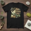 Sip Slowly Live Fully quote with a teapot and tea cup graphic on a black t-shirt