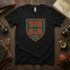 Black t-shirt with a shield design featuring "SIR SIR IIR" in red collegiate font on a green background