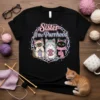 Sister of the Purrhood t-shirt design featuring three cute cats knitting with yarn, pastel colors, and playful typography