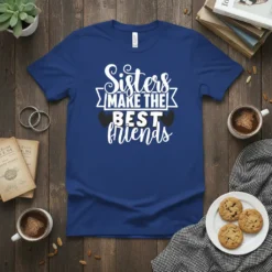 Blue t-shirt with white text that reads "Sisters Make The Best Friends" and small heart graphics