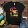 Sisters On The Loose Sister's Trip 2026 t-shirt design featuring three women, a convertible car, palm trees, and a sunset