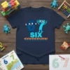 SIX SEVEEEEVEN t-shirt design with cartoon numbers 6 and 7, and text SIX SEVEEEEVEN
