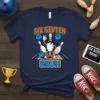 Six Sevten Bruh text with cartoon bowling pins and balls graphic on a navy t-shirt