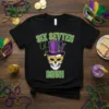 Black t-shirt with "SIX SEVTEN BRUH" text and a skull wearing a purple Mardi Gras hat and gold mask