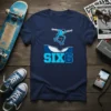 SIX6 t-shirt design featuring a skateboarder mid-air over a ramp with bold SIX6 text below, navy blue shirt