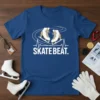 Figure skating heartbeat design with "SKATE BEAT." text and ice skates on a blue t-shirt