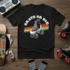 Black t-shirt with "SKATE OR DIE" text above a retro roller skate graphic with striped background