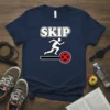 T-shirt with the word SKIP above a running figure and a red circle with an X, indicating "skip it"