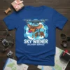 Sky Wiener Delivery Service t-shirt design with a dachshund riding a drone, holding a package, with clouds and sun graphic