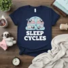 Sleep Cycles t-shirt design featuring four pugs sleeping in various positions with zzz graphics