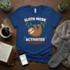 Sloth Mode Activated text with a cute hanging sloth graphic on a blue t-shirt