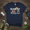 Slow AF Running Club t-shirt design with a cartoon snail wearing sunglasses and a headband, pulling a cart of balls