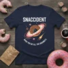 Snaccident When You Eat All The Doughnuts t-shirt with a cartoon donut planet and a comet
