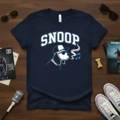 Navy t-shirt with "Snoop" in collegiate font and a beagle dog wearing sunglasses and a cap, blowing smoke and musical