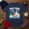Snow Tubing Is My Favorite Season t-shirt with a family and yeti on a snow tube, surrounded by snowflakes and