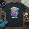 Snowboard Axolotol t-shirt design featuring a cute axolotl character snowboarding down a slope with text