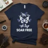 Navy t-shirt with white text "SOAR FREE" below a cluster of white butterflies
