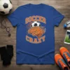 Blue t-shirt with "SOCCER CRAZY" text and a graphic of a soccer ball over a brain