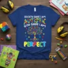 Society Says I Am Autistic God Says I Am Perfect tee with colorful puzzle tree design and autism awareness symbols
