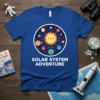 Blue t-shirt with "SOLAR SYSTEM ADVENTURE" text and cartoon planets orbiting a smiling sun