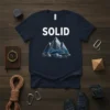 Navy t-shirt with "SOLID" text above a geometric mountain graphic and rocks, primary keyword SOLID