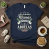 T-shirt with Spanish text "Solo las Mejores Mamás son Promovidas a Abuelas" and floral accents, navy blue color