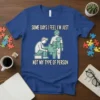 T-shirt design with text "SOME DAYS I FEEL I'M JUST NOT MY TYPE OF PERSON" and a graphic of a