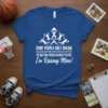 Basketball mom t-shirt with white text "SOME PEOPLE ONLY DREAM OF MEETING THEIR FAVORITE PLAYER I'm Raising Mine!" and silhouette