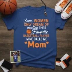 Blue t-shirt with text "Some WOMEN ONLY DREAM OF meeting THEIR Favorite BASKETBALL PLAYER MINE CALLS ME Mom" in white