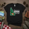 Someone in IDAHO loves me t-shirt with a sleeping fox inside the Idaho state outline graphic