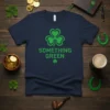 Navy blue t-shirt with "SOMETHING GREEN" text and a large green shamrock graphic, perfect for St. Patrick's Day
