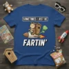 Sometimes I Just Be Fartin' text on a blue t-shirt with a cartoon cat riding a rocket, funny graphic design