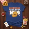Sometimes Ya Just Need A Nug quote in playful typography with a cute chicken nugget graphic on a blue t-shirt