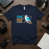 Song Bird Studio Inc. text with a cartoon bird wearing headphones on a dark navy t-shirt