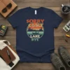 Sorry Can't Lake Bye t-shirt featuring a vintage sunset scene with a boat and mountains, designed for fishing and lake