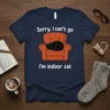 Sorry I Can't Go I'm Indoor Cat t-shirt design with a black cat sleeping on an orange armchair