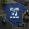 Sorry I Can't Hear You I'm Gaming t-shirt with headphones graphic. White text on a navy blue shirt